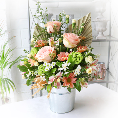 Dawn - Pretty, feminine arrangement in classic pastel tones.

Seasonal selection, beautifully arranged in oasis for an instant display.

Hand delivered with gift card, flower food, and care instructions.