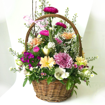 Happy Thoughts - Make their day with a pretty pastel basket of flowers. 

Beautiful seasonal flowers arranged in oasis for an instant display.

Hand delivered with gift card, flower food, and care instructions.