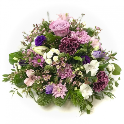 Petite Grave Posy - Simple classic fresh flower posy grave arrangement suitable for funeral or anniversary.

Seasonal selection carefully arranged in oasis with a hand written display card for your message.

Our funeral tributes are created to order and hand delivered to the funeral director or church as is most appropriate.